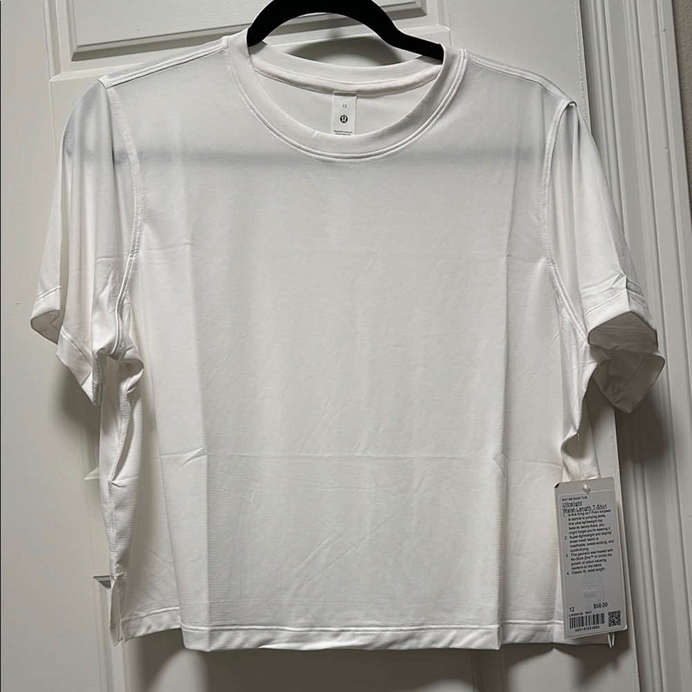 Lululemon Women’s Ultralight Waist-Length T-Shirt in White, Size 12